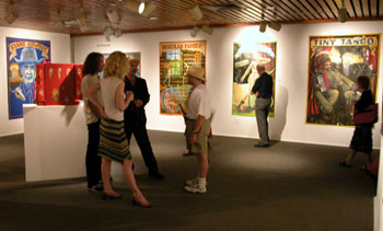 Kevin House talking with gallery visitors